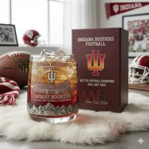 A whiskey glass with Indiana Hoosiers stadium and championship graphics beside a printed box and football items!