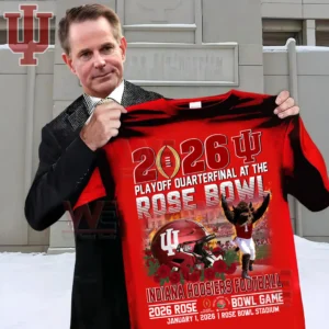 A red Indiana Hoosiers Rose Bowl twenty twenty six playoff shirt with helmet mascot and stadium graphics held by a man in a suit!