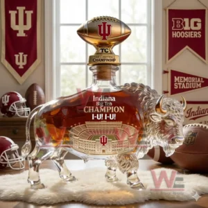 Buffalo shaped whiskey bottle with stadium design and amber drink displayed in a college themed sports room!