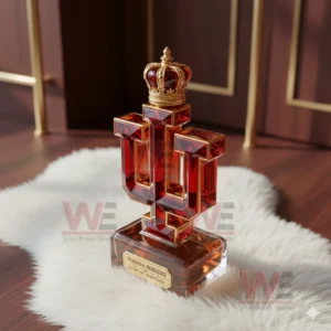 Red glass letter shaped whiskey bottle with gold crown standing on white fur in a refined room!