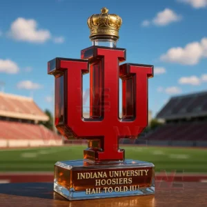 Red IU glass bottle with crown stopper placed on a sports field table!