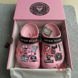 Inter Miami Crocs Clogs with Charms 7 Pink Inter Miami clogs in a branded box decorated with multiple soccer themed charms.