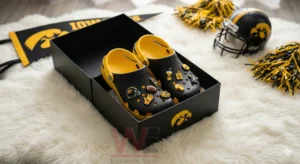 Iowa Hawkeyes Crocs Crocband Clogs with Charms 4 Black and yellow Iowa Hawkeyes clogs with decorative charms arranged inside a black presentation box!