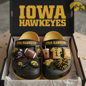 Iowa Hawkeyes Crocs Crocband Clogs with Charms 5 Iowa Hawkeyes clogs decorated with football and team themed charms displayed neatly inside a branded box!