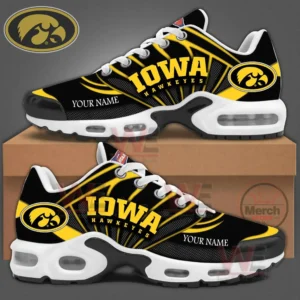 Iowa Hawkeyes black and yellow sneakers with team logos and customizable name text shown above a shoebox!