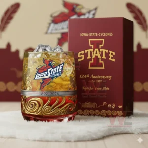 Ornate Iowa State Cyclones anniversary glass with gold detailing and iced drink next to a red presentation box displaying the team logo and celebration text!