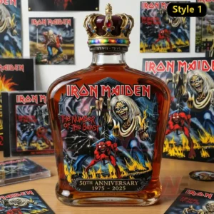 Iron Maiden 50th Anniversary Collector’s Whiskey Decanter 5 A whiskey decanter with vivid Iron Maiden artwork and crown stopper is displayed on a desk with album covers in the background!