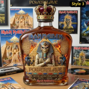Iron Maiden 50th Anniversary Collector’s Whiskey Decanter 7 A whiskey decanter with Iron Maiden Powerslave inspired design and crown stopper is displayed on a table with band memorabilia!