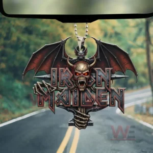 Iron Maiden Custom Skull Batwing 3D Car Ornament 5 Hanging Iron Maiden ornament with a horned skull red eyes and bat wings displayed over bold metal lettering in front of a blurred forest road!
