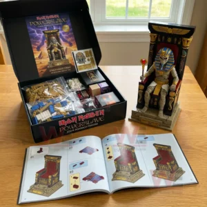 Brick pharaoh throne model displayed with its box loose parts and an open instruction book on a table!