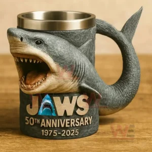 Shark shaped movie anniversary mug with open mouth handle and textured detail on a wooden table!