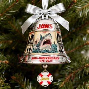 A Christmas bell ornament with Jaws shark artwork a silver bow and a lifebuoy charm marking the fiftieth anniversary nineteen seventy five to twenty twenty five!