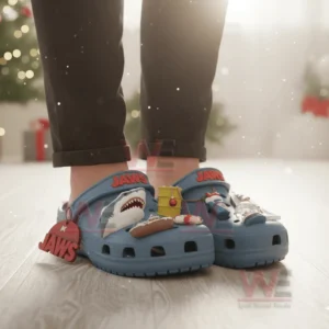 Jaws Shark Christmas Crocs Clogs with Charms 5 Blue Jaws themed Christmas clogs with shark and ocean charms worn in a festive setting!