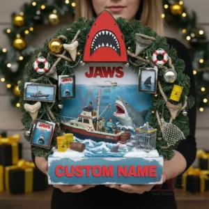 Jaws Shark Custom Christmas Decoration Wreath Ornament 3 Handheld Christmas wreath with shark movie scene boat figures nautical decorations pine branches and festive lights in the background!