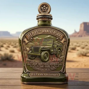 Green anniversary bottle with raised Jeep design placed outdoors in a desert setting under a clear sky!