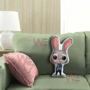 Rabbit police character pillow standing on a green sofa with soft cushions!