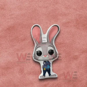 Rabbit police pillow shown on a pink fabric background with clean and simple styling!