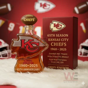 Anniversary whiskey bottle and red presentation box on a soft white surface with sports decor!