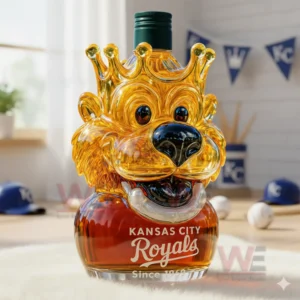 Lion shaped whiskey bottle with crown filled with amber liquor on a white surface!