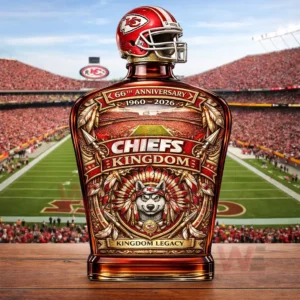 Chiefs themed whiskey bottle with helmet stopper displayed against a football stadium background!
