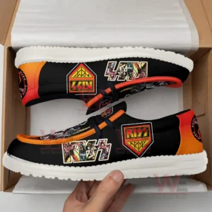 Black and orange shoes with band themed graphics resting inside an open shoe box!