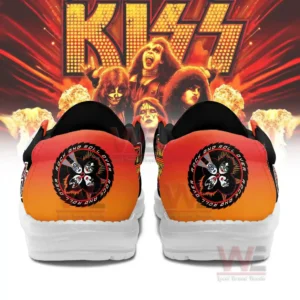 Back view of black and orange shoes with circular band themed emblems on the heels!