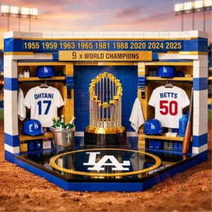 Building block Dodgers locker room scene with Ohtani and Betts jerseys helmets gear and a gold championship trophy under a world champions banner!