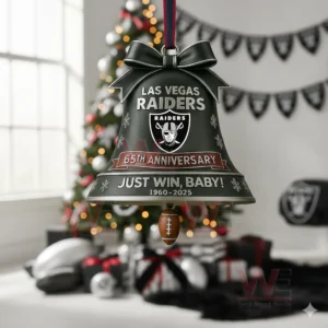 A Raiders anniversary bell ornament hanging in a festive room with team colors.