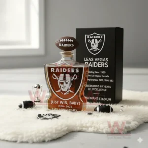 Raiders anniversary whiskey bottle displayed indoors with football themed decor and box!