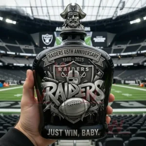 Las Vegas Raiders 65Th Anniversary Just Win Baby 2025 Whiskey Bottle 5 Raiders commemorative whiskey bottle with pirate stopper silver team design held in a stadium setting!