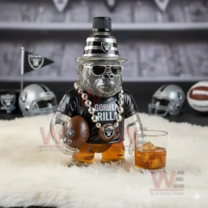 Gorilla shaped whiskey bottle with sunglasses football and a glass of amber liquid on a white surface!