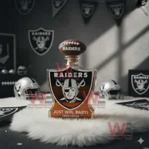 A Raiders themed whiskey bottle with team logos placed among football helmets and decorative items in a tribute styled room!
