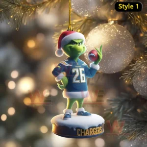 A green character in a Chargers jersey and Santa hat holding a football on a snowy ornament base!