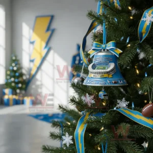 Blue and gold football bell ornament with stadium design displayed on a festive Christmas tree indoors!