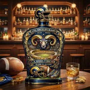 Decorative Los Angeles Rams themed bottle with ram artwork football items and stadium imagery placed on a wooden bar table!