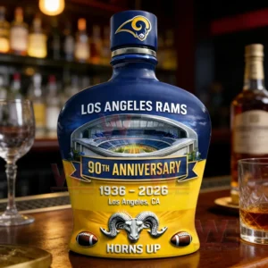 Los Angeles Rams ninetieth anniversary bottle on a bar counter with warm background lighting and blurred bottles and glasses!
