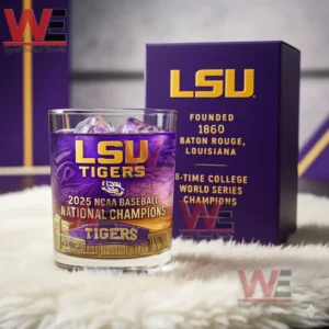 An LSU Tigers glass with purple ice beside a purple championship box on a white surface!