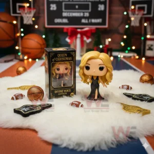 Queen of Christmas figure with gold microphone displayed beside its box on a festive sports court setup.