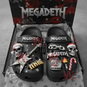 Black Megadeth clogs displayed in a box filled with themed paper and decorated with guitar bullet and skull charms!