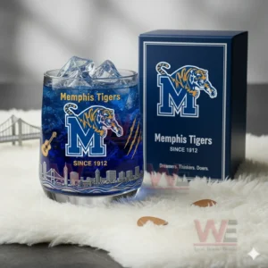 Memphis Tigers glass with blue iced drink placed indoors with team themed decor!