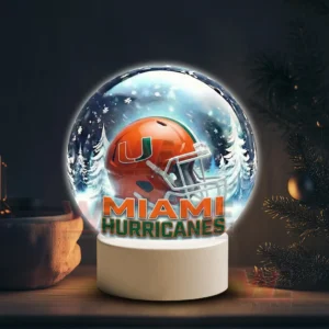 Miami Hurricanes LED Snow Globe Night Light Christmas Ornament 5 Snowy themed decorative globe with a Miami Hurricanes helmet on a white stand!