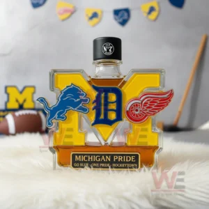 Michigan Pride whiskey bottle with amber liquid and team logos displayed on white fur with sports decor!