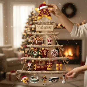 A handcrafted wooden branch tree ornament display hangs in a living space decorated for the holidays featuring Minnesota themed decorations and soft glowing lights.