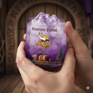 Minnesota Vikings Limited Edition Skol Vikings Whiskey Glass 3 Hands holding a Minnesota Vikings whiskey glass with purple drink ice cubes in a warm indoor setting!