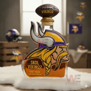 A Vikings themed anniversary bottle with a football cap sitting on a white fur surface with helmets and flags in the background.