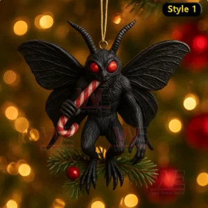 A black creature with large wings and red eyes sits on a pine branch holding a candy cane!