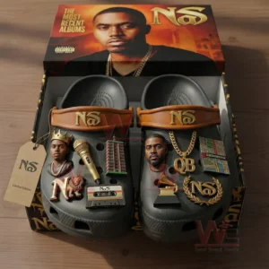 Dark clogs inside a branded box with rap music charms portraits symbols and award inspired details!