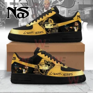Gold and black Nas Light Years themed sneakers with portrait artwork and bold Light Years text shown with a shoebox and street style background!