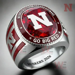 Red and silver Nebraska Cornhuskers football ring with a large red gemstone look center and classic team inspired design!