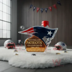 A red capped Patriots logo bottle set on a rug surrounded by football decor!